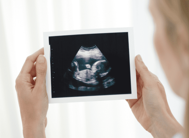 Joy and Financial Challenges of Parenthood Image